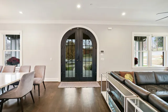 a view of a entryway with wooden floor