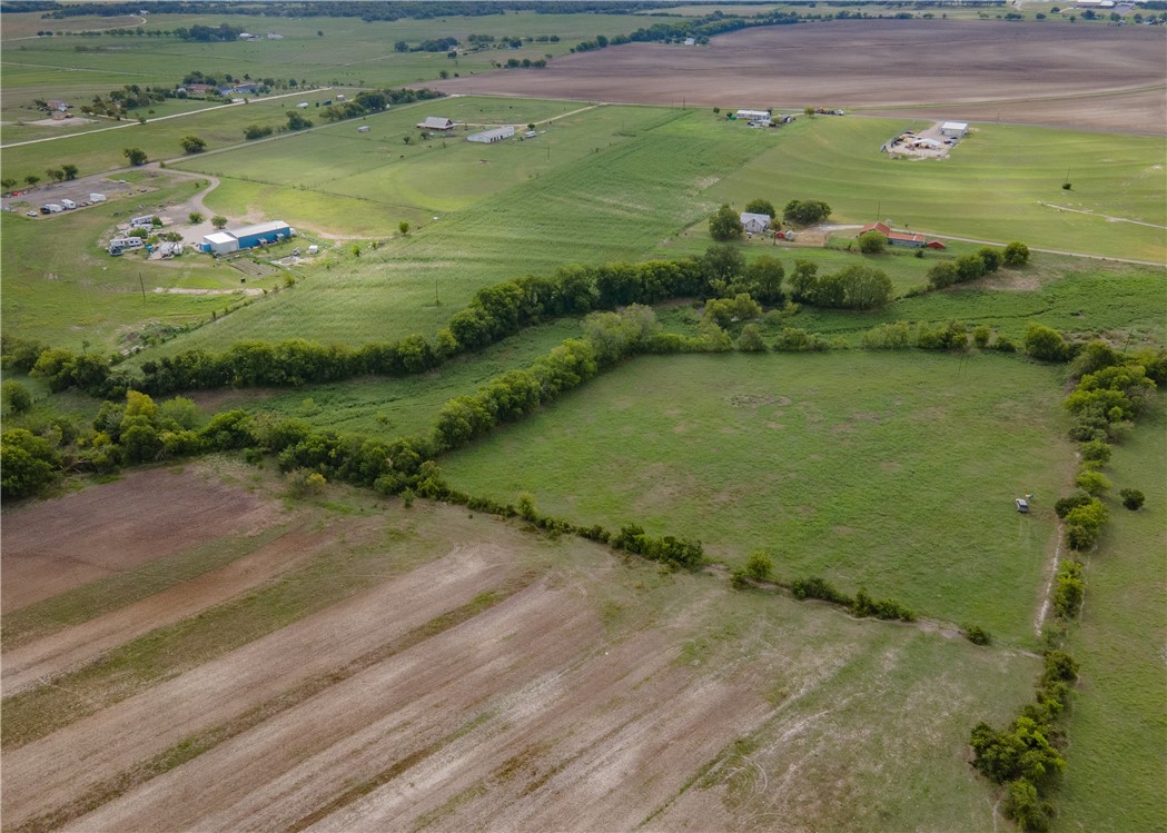 2201 County Road 311 Jarrell, TX 76537 - Photo 4 of 20 a view of a water pond with green field