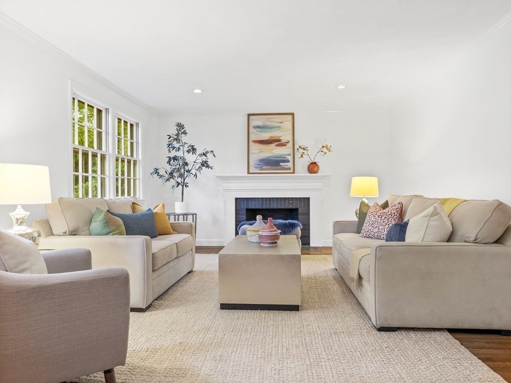 43 Tanglewood Road Wellesley, MA 02481 - Photo 4 of 19 a living room with furniture and a fireplace