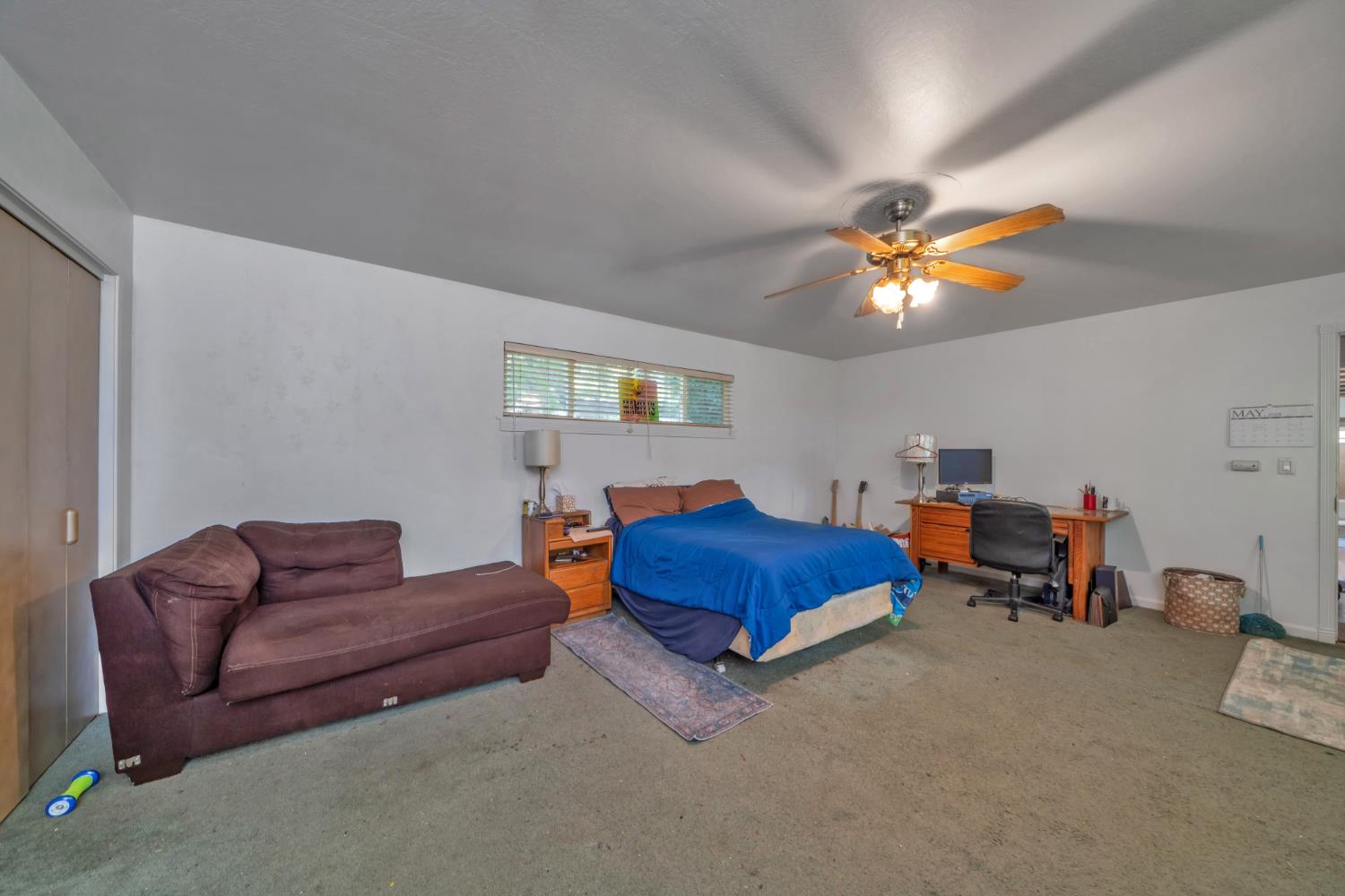 6929 Split Bend Road Pollock Pines, CA 95726 - Photo 29 of 38 a living room with furniture and a chandelier