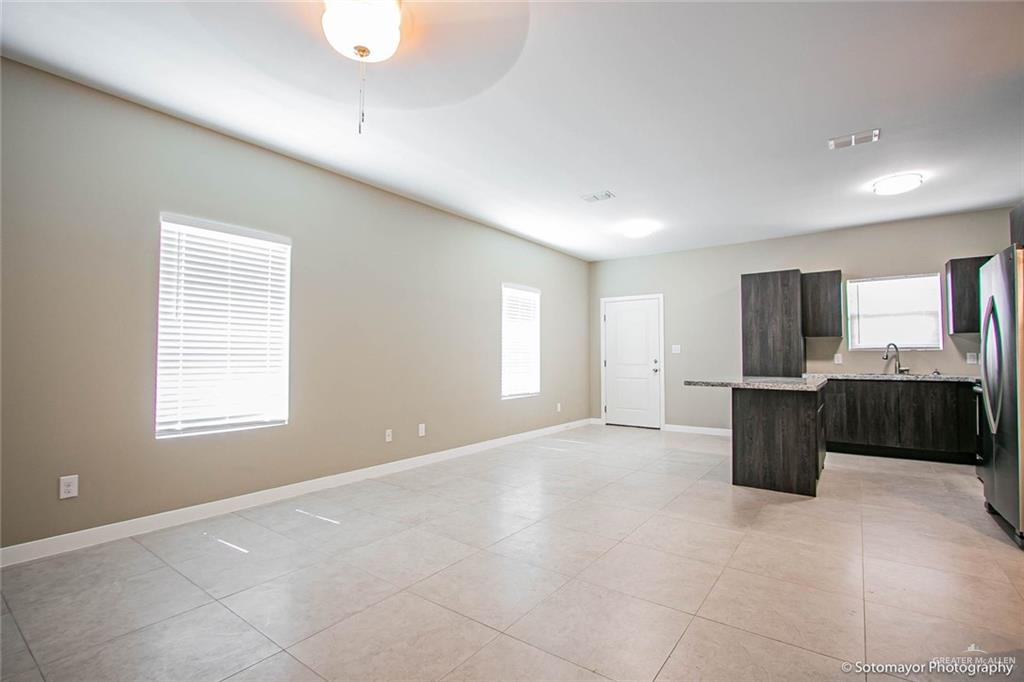 3408 Golden Nugget, Unit 1 Edinburg, TX 78541 - Photo 3 of 8 a view of an empty room with a kitchen