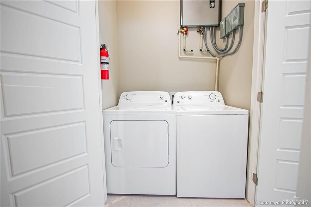 3408 Golden Nugget, Unit 1 Edinburg, TX 78541 - Photo 6 of 8 a utility room with dryer and washer