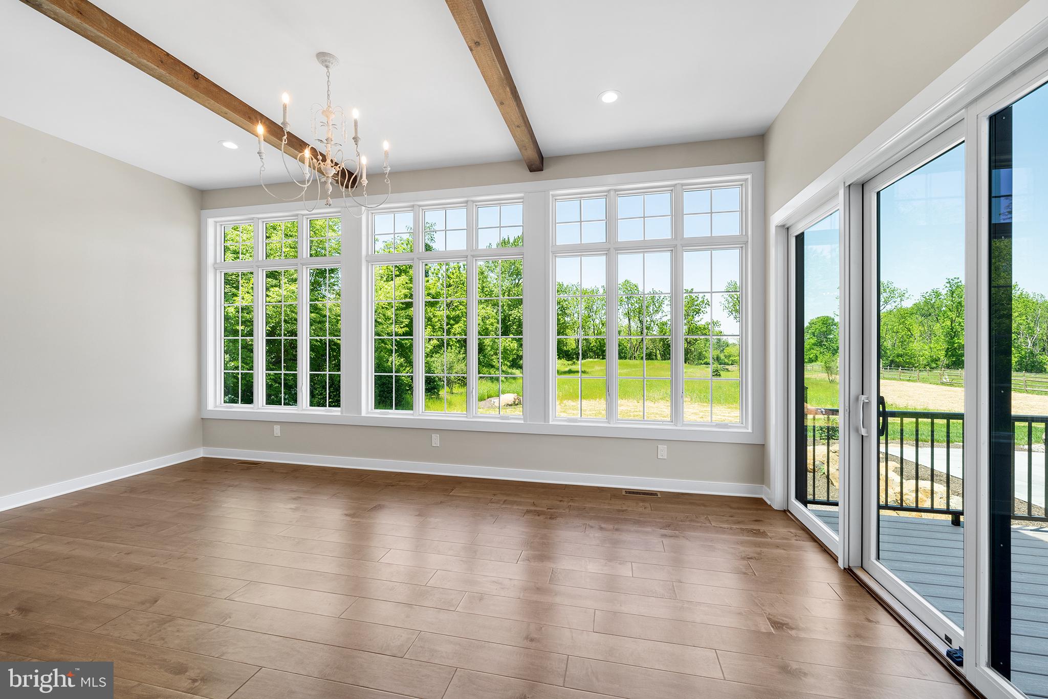 744 Broad Street Perkasie, PA 18944 - Photo 22 of 55 a view of empty room with wooden floor and fan
