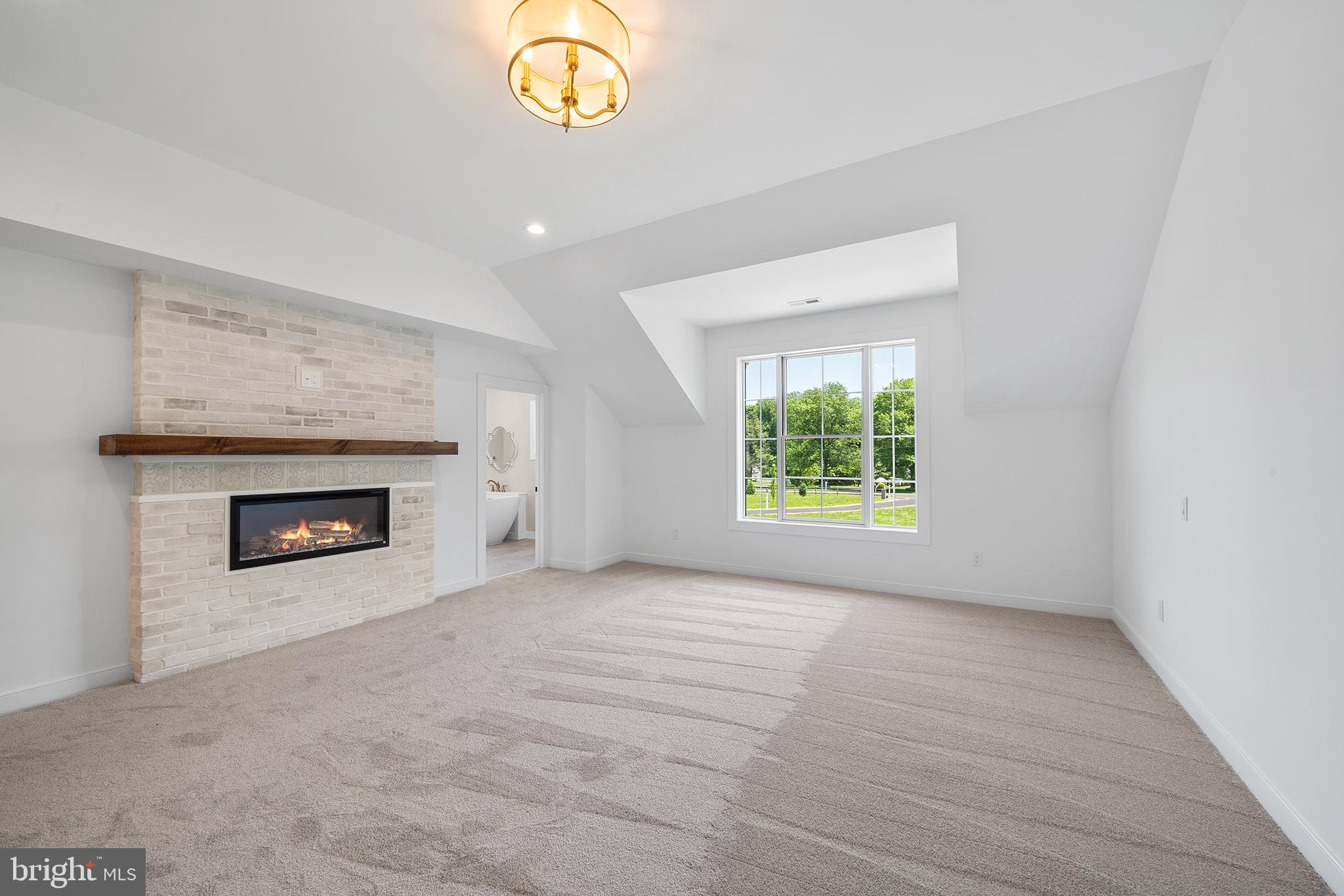 744 Broad Street Perkasie, PA 18944 - Photo 31 of 55 an empty room with windows and fireplace