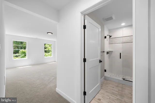 an empty room with windows