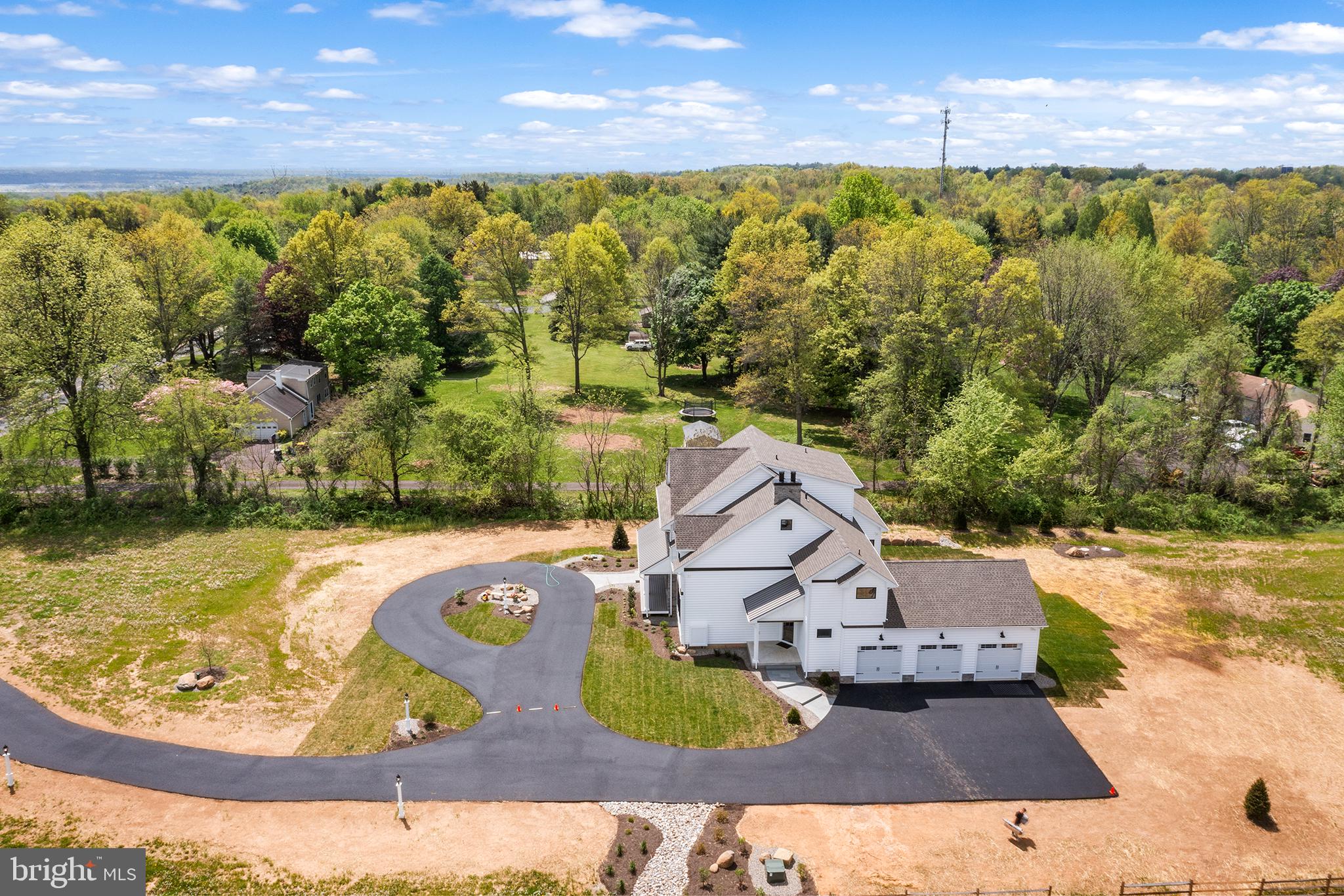 744 Broad Street Perkasie, PA 18944 - Photo 55 of 55 a view of a swimming pool with an outdoor seating