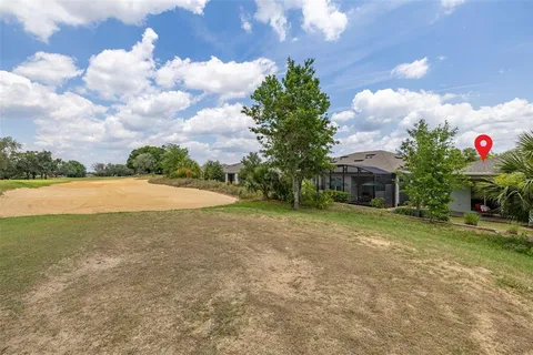 a view of a city with mountains in the background