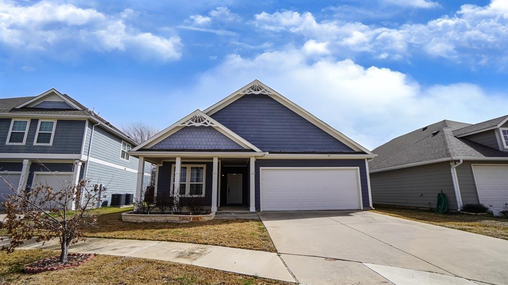 2312 Arrowhead Drive Denton, TX 76207 - Photo 1 of 1 a front view of a house with garden
