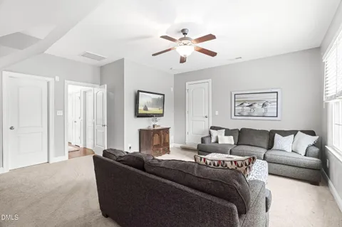 a view of a balcony with furniture