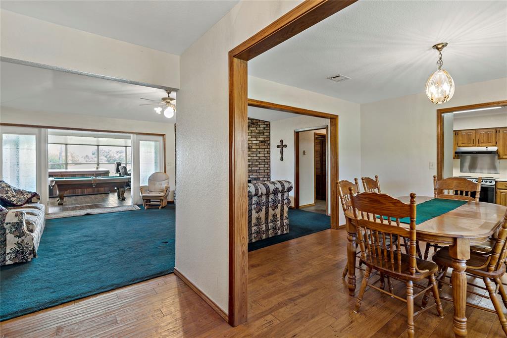 4395 Farm Road 2820 Brookston, TX 75421 - Photo 14 of 33 a view of a dining room with furniture and window