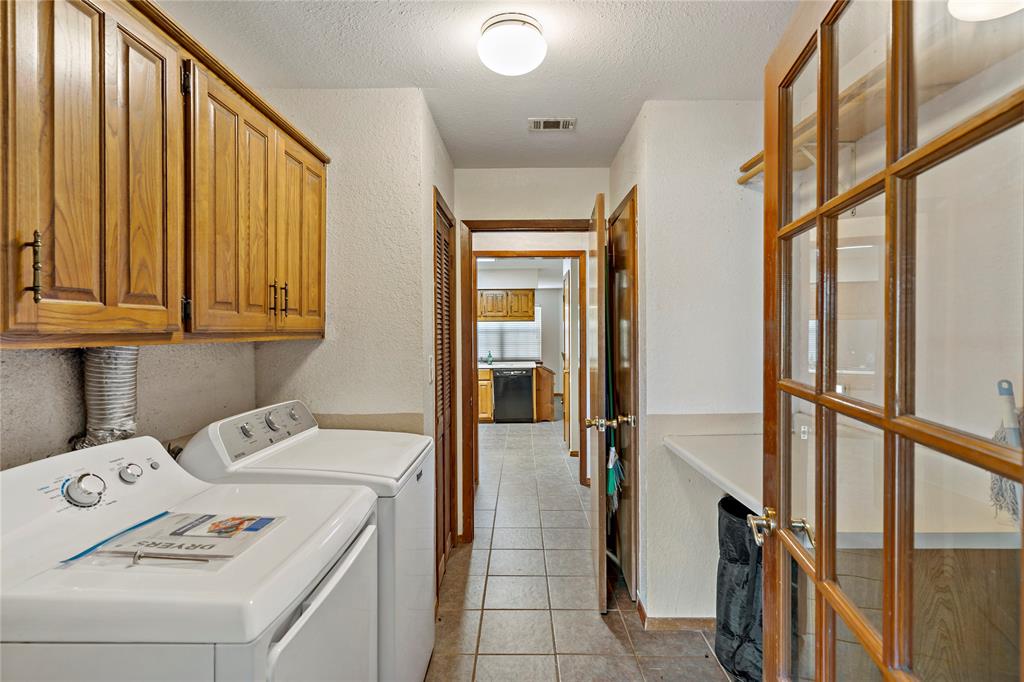 4395 Farm Road 2820 Brookston, TX 75421 - Photo 31 of 33 a utility room with dryer and washer