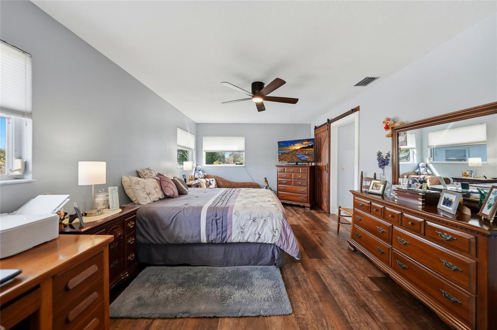 405 Ridgecrest Drive Punta Gorda, FL 33982 - Photo 12 of 30 a bed room with a bed and a walk in closet