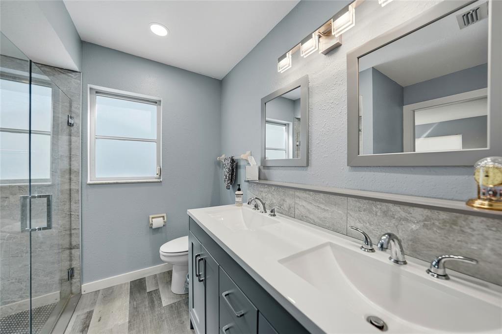 405 Ridgecrest Drive Punta Gorda, FL 33982 - Photo 13 of 30 a bathroom with a sink and a toilet
