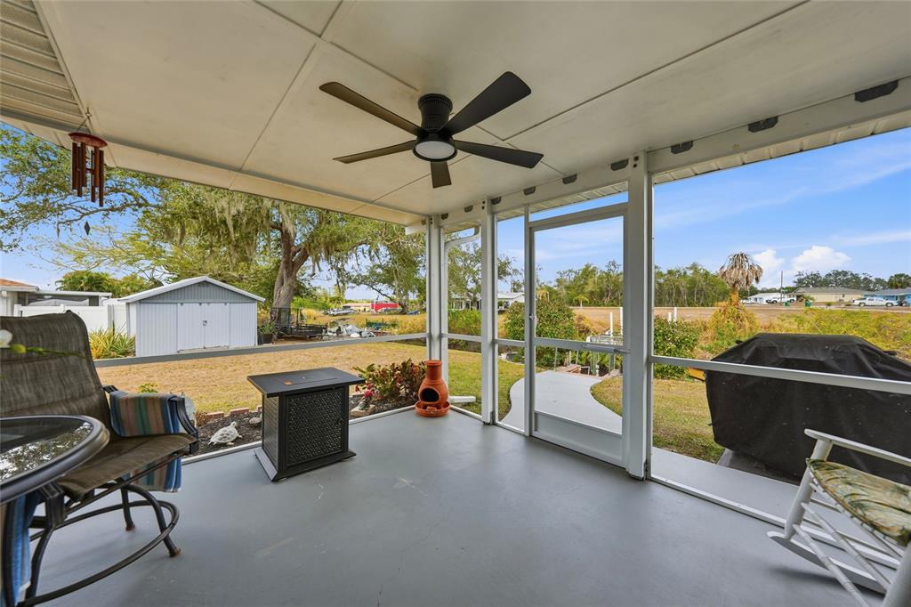 405 Ridgecrest Drive Punta Gorda, FL 33982 - Photo 20 of 30 a view of a chairs and table in a room