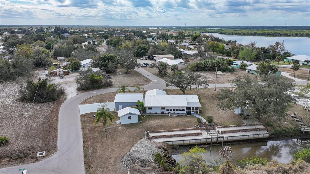 405 Ridgecrest Drive Punta Gorda, FL 33982 - Photo 25 of 30 an aerial view of a house with a yard