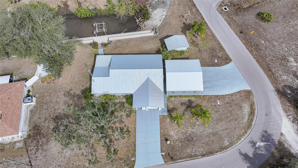 405 Ridgecrest Drive Punta Gorda, FL 33982 - Photo 29 of 30 an aerial view of a house with a yard