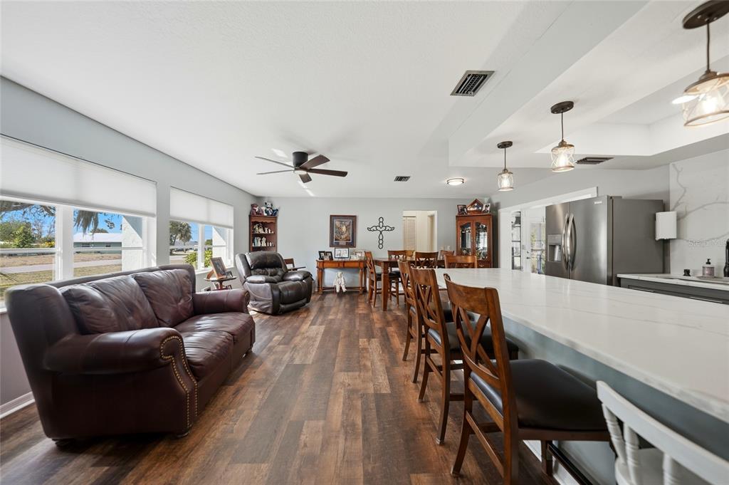 405 Ridgecrest Drive Punta Gorda, FL 33982 - Photo 3 of 30 a living room with furniture and a wooden floor