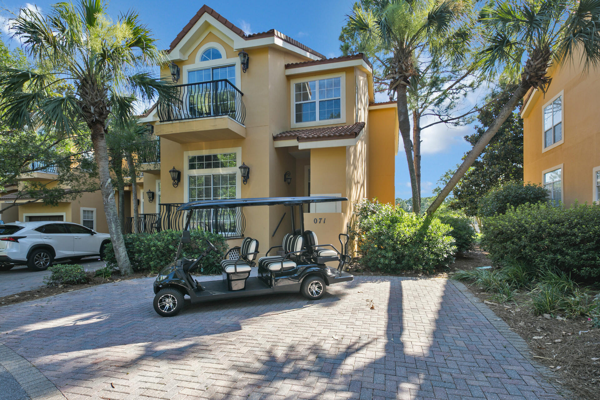Front of Home with Golf Cart