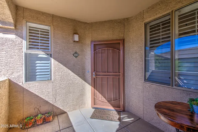 a view of balcony with furniture