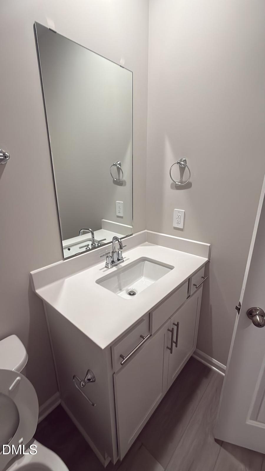 710 White Birch Lane Angier, NC 27501 - Photo 11 of 31 a bathroom with a sink toilet and mirror