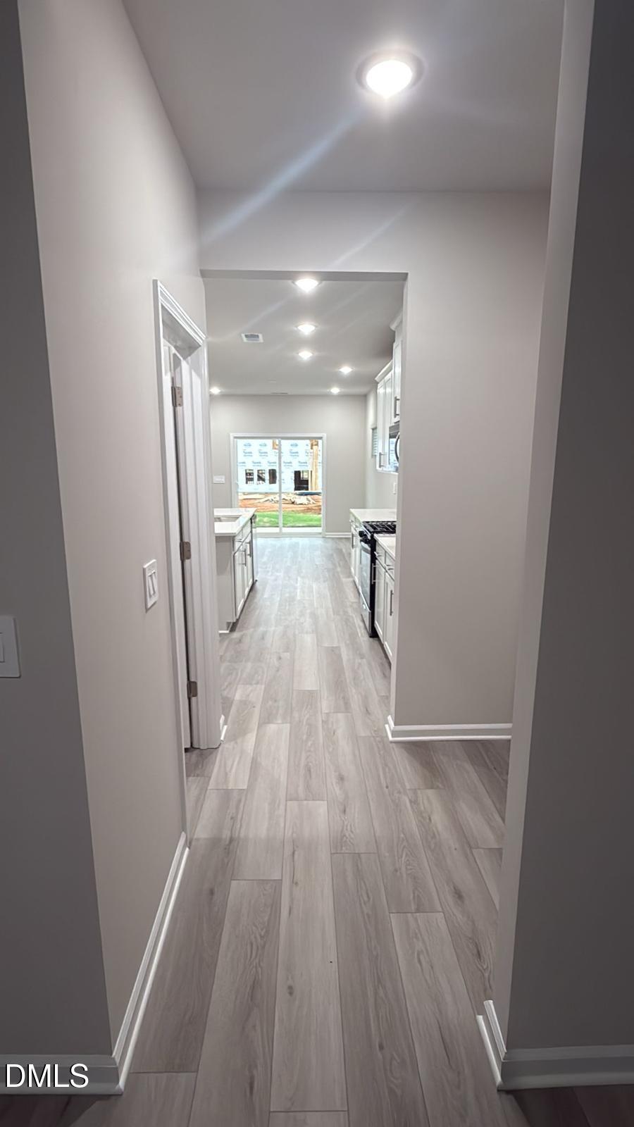 710 White Birch Lane Angier, NC 27501 - Photo 4 of 31 a view of hallway with wooden floor