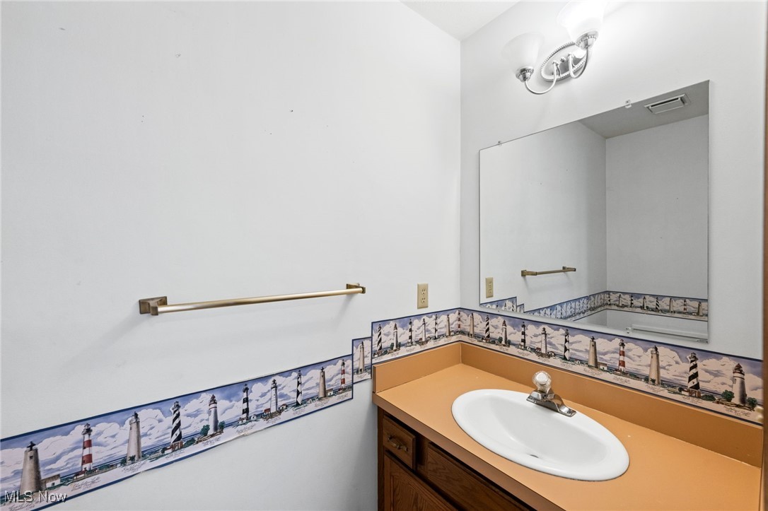 31655 Arthur Road Solon, OH 44139 - Photo 13 of 27 Half Bathroom with vanity
