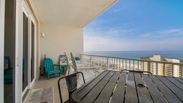 a view of balcony with furniture