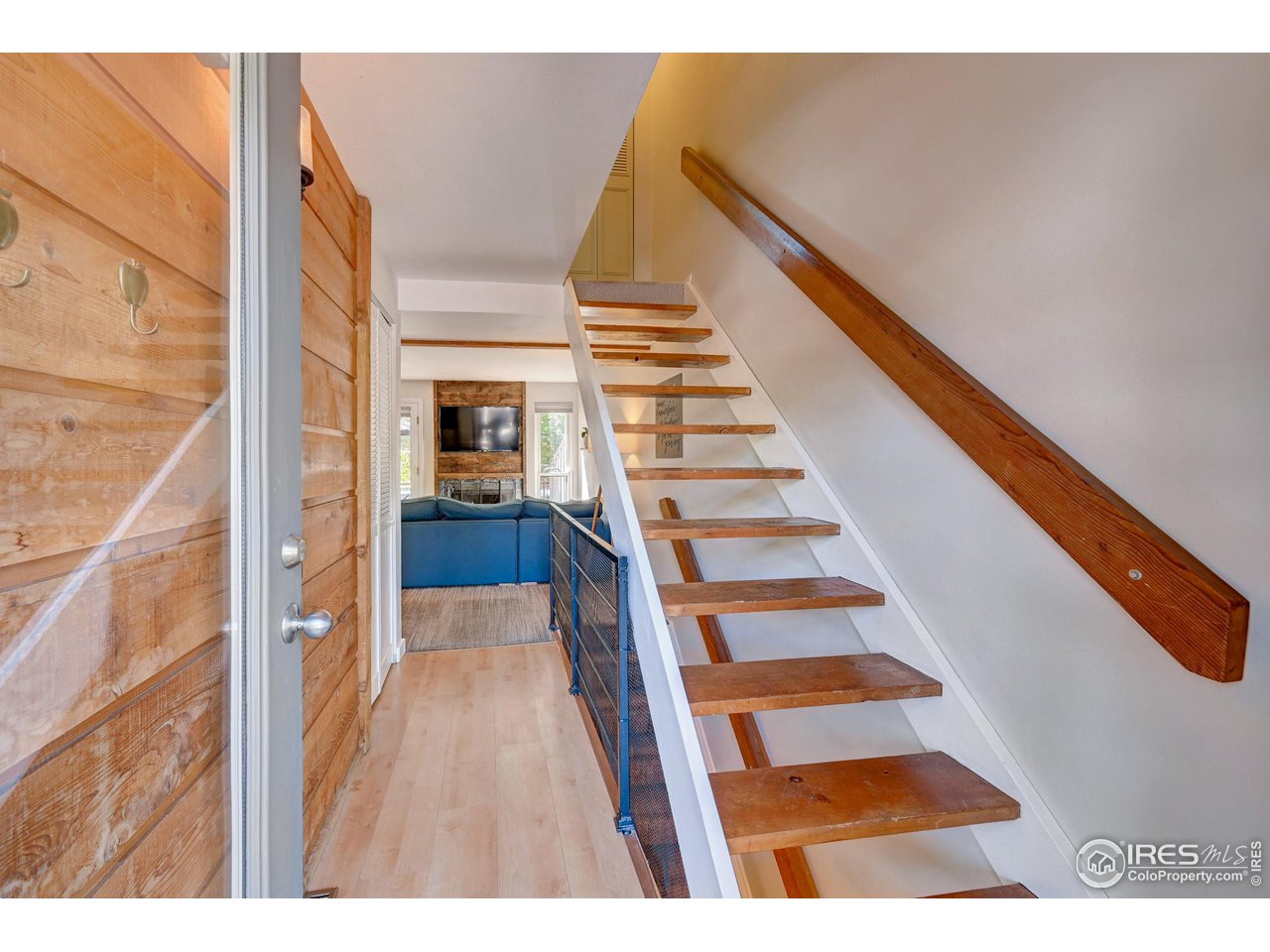 1265 Bear Mountain Drive, Unit B Boulder, CO 80305 - Photo 17 of 24 a view of entryway with wooden floor
