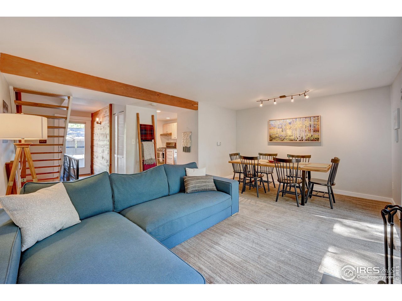 1265 Bear Mountain Drive, Unit B Boulder, CO 80305 - Photo 4 of 24 a living room with furniture and a wooden floor
