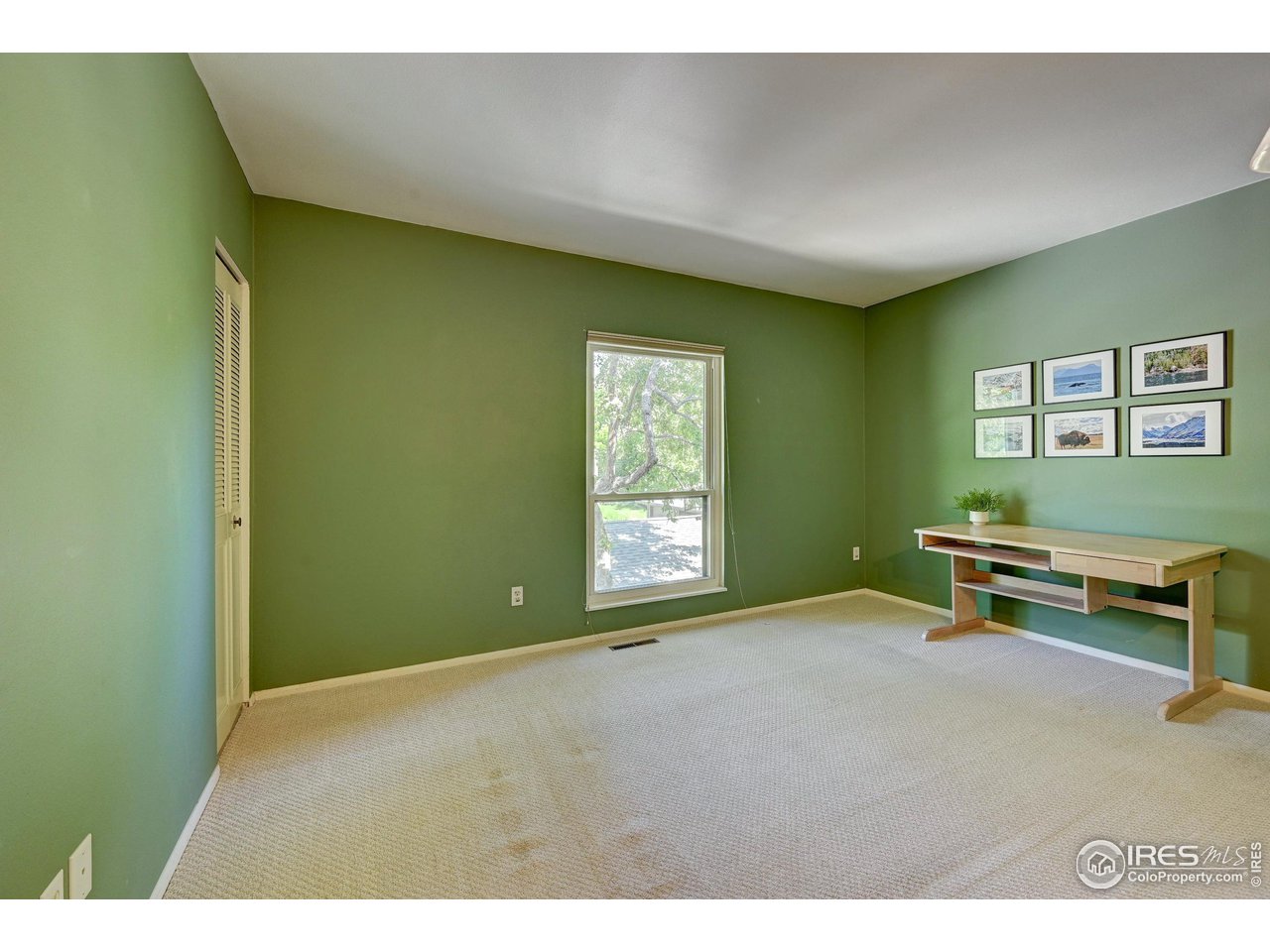 1265 Bear Mountain Drive, Unit B Boulder, CO 80305 - Photo 8 of 24 a view of an empty room with a window