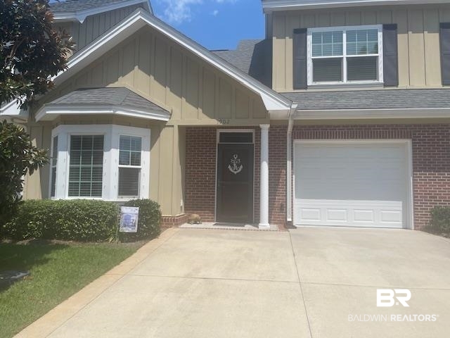 430 West Fort Morgan Road, Unit 1902 Gulf Shores, AL 36542 - Photo 58 of 59 View of front of house featuring a garage