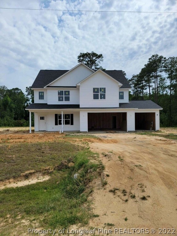 2650 Riddle Farm Fayetteville, NC 28306 - Photo 1 of 2 a front view of a house with a yard