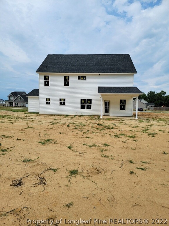 2650 Riddle Farm Fayetteville, NC 28306 - Photo 2 of 2 a front view of a house with a yard