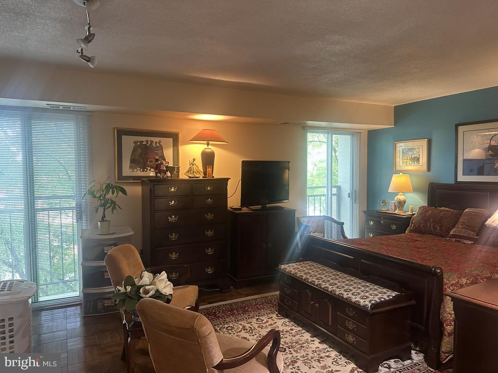 700 7th Street Southwest, Unit 526 Washington, DC 20024 - Photo 18 of 53 Serene bedroom with vibrant accents.