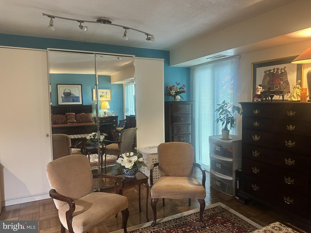 700 7th Street Southwest, Unit 526 Washington, DC 20024 - Photo 19 of 53 Charming living space with mirrored accents.