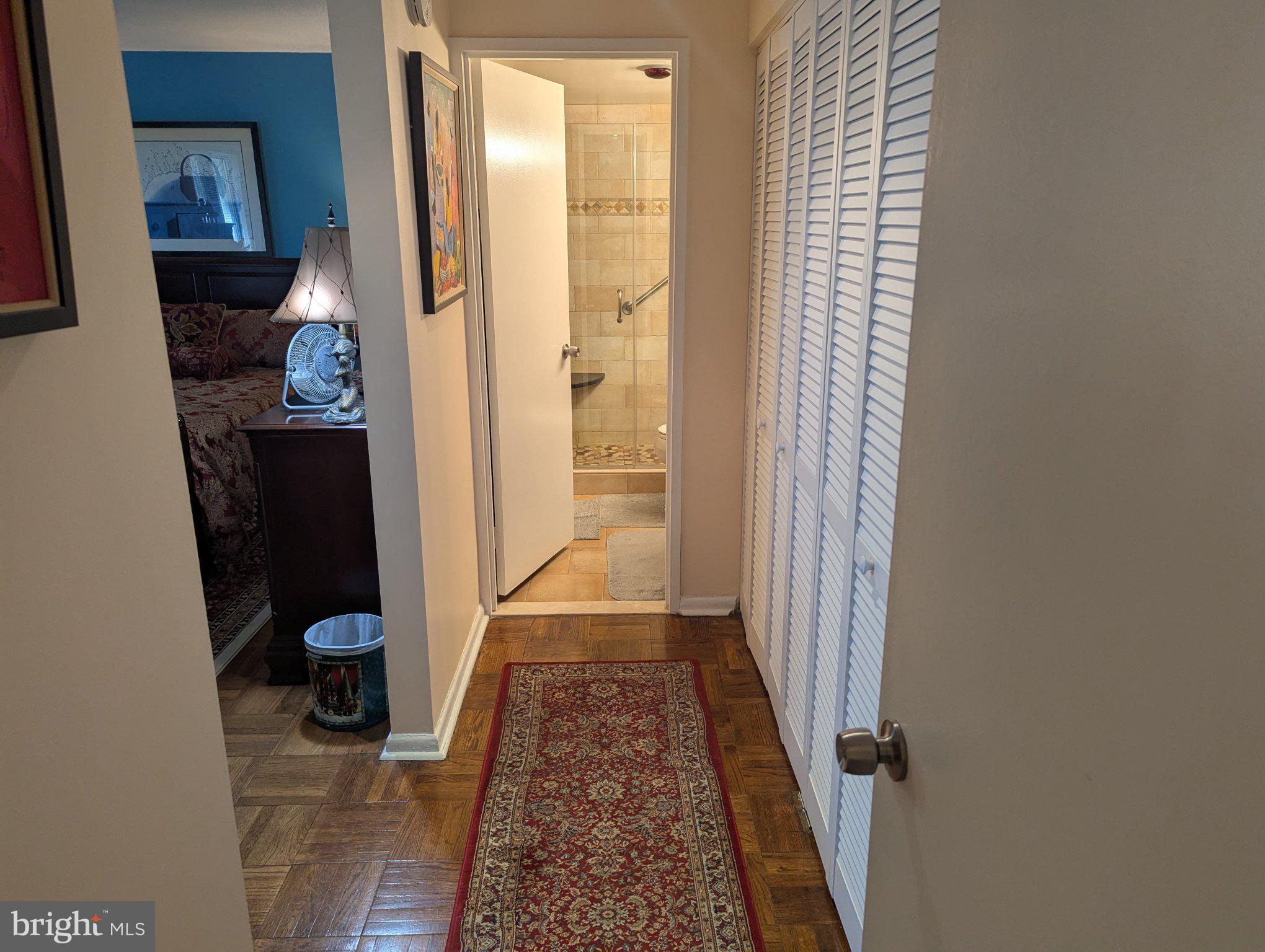 700 7th Street Southwest, Unit 526 Washington, DC 20024 - Photo 20 of 53 Inviting hallway with warm tones.