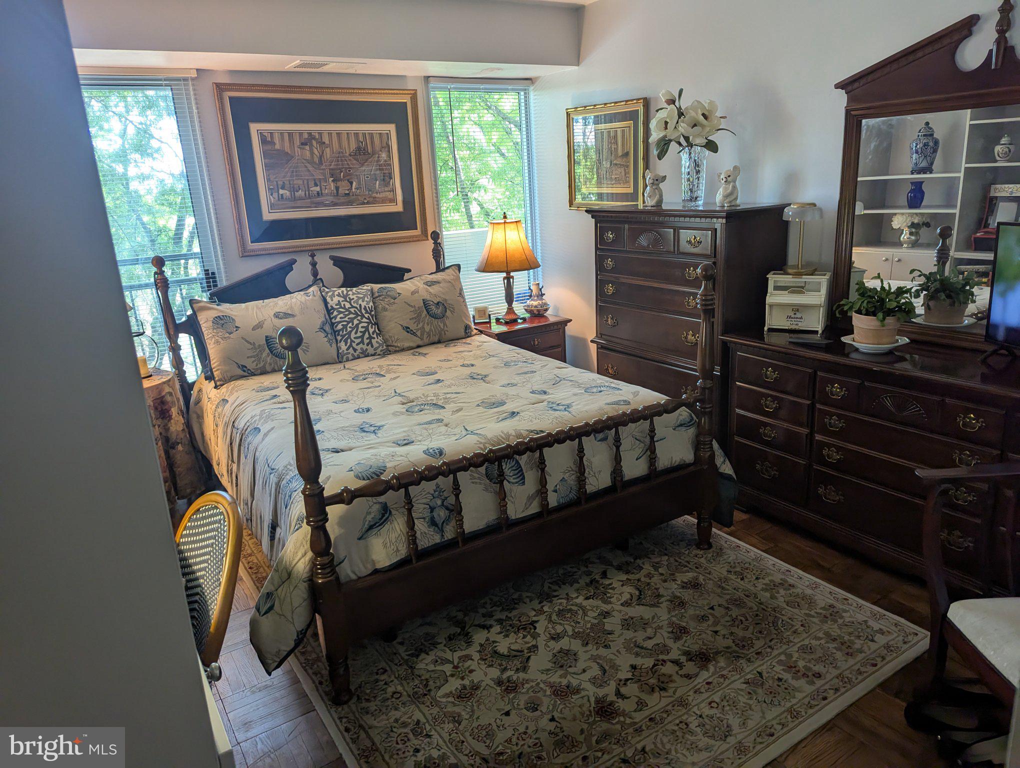 700 7th Street Southwest, Unit 526 Washington, DC 20024 - Photo 23 of 53 Serene bedroom with nature views.