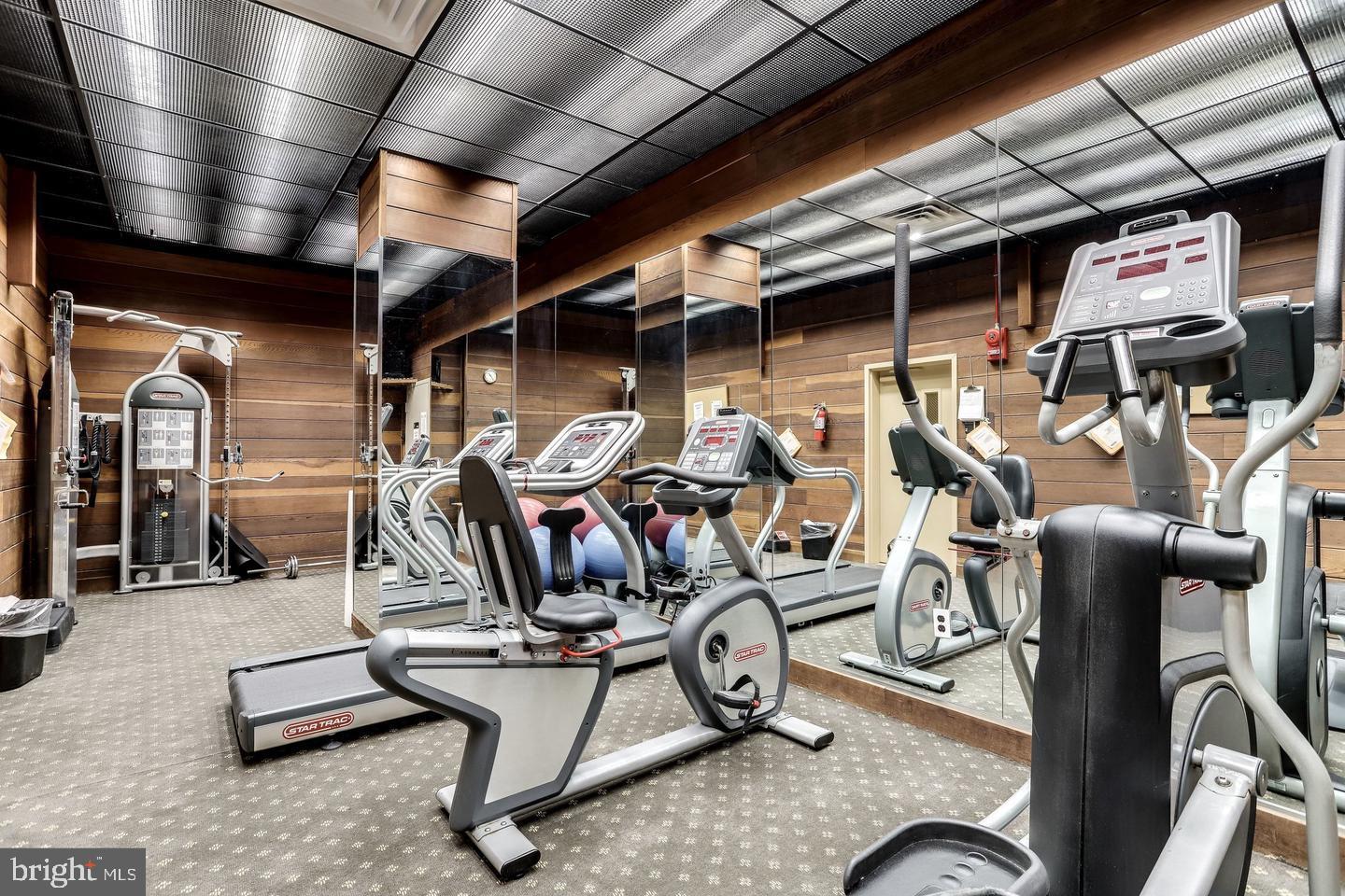 700 7th Street Southwest, Unit 526 Washington, DC 20024 - Photo 30 of 53 Modern fitness space with sleek equipment.