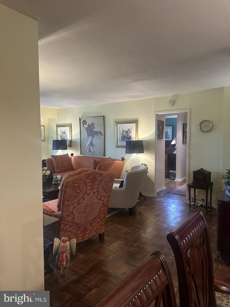 700 7th Street Southwest, Unit 526 Washington, DC 20024 - Photo 6 of 53 Inviting living space with warm tones.