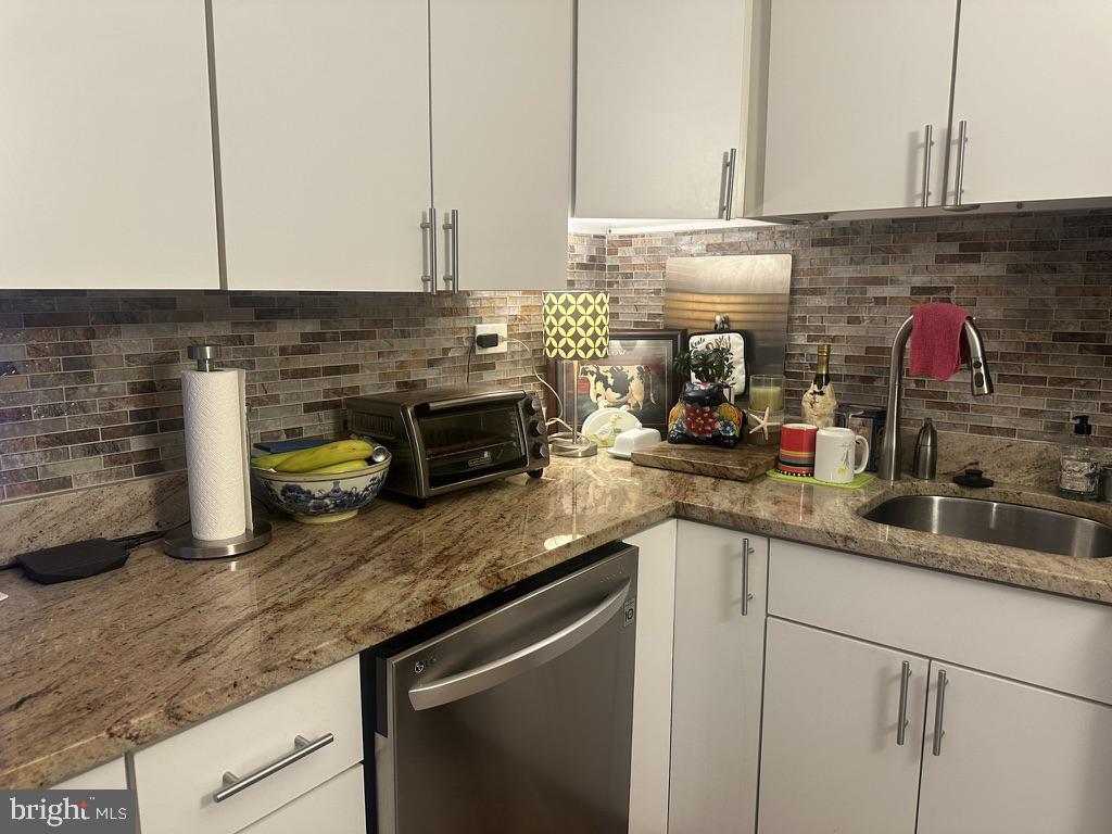 700 7th Street Southwest, Unit 526 Washington, DC 20024 - Photo 10 of 53 Modern kitchen with stylish accents.