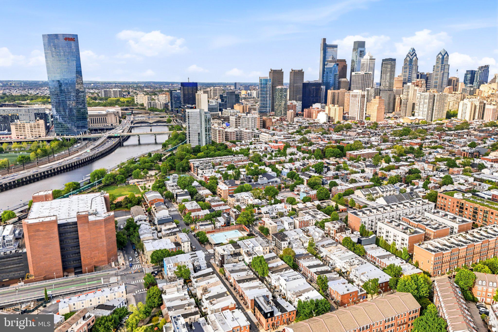 523 South 27th Street Philadelphia, PA 19146 - Photo 29 of 36 Vibrant cityscape meets serene river.