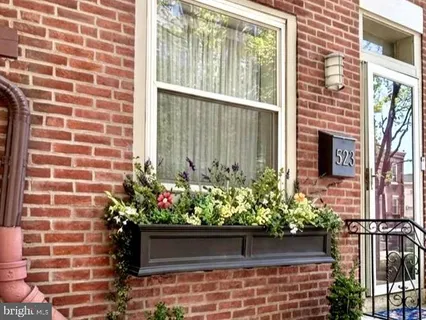 a view of a garden with a chair