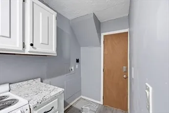 a storage room with washer and dryer
