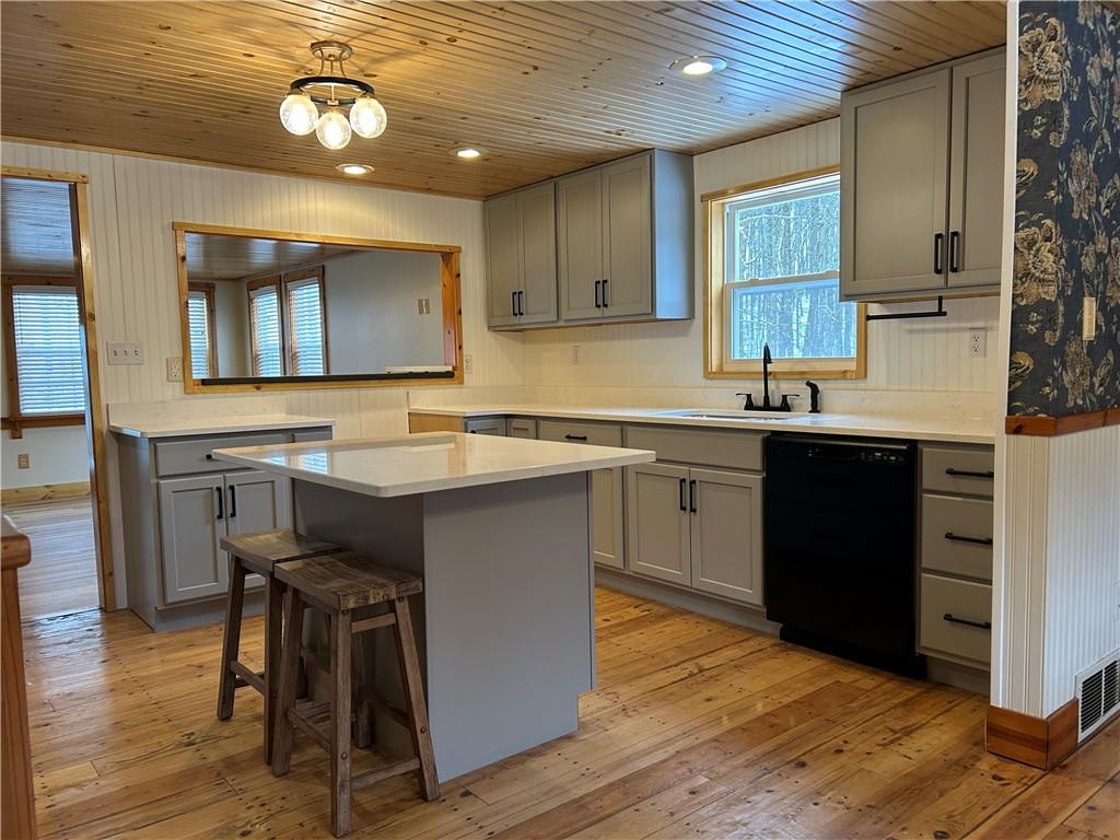 1675 Raspberry Road Clymer, PA 15728 - Photo 2 of 36 Gorgeous kitchen with new cabinets with slow closing drawers, quartz countertops, and refinished hardwood floors.