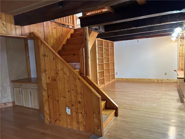 a view of entryway with wooden floor