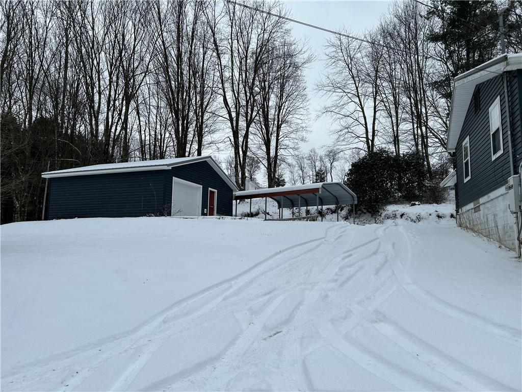 1675 Raspberry Road Clymer, PA 15728 - Photo 37 of 43 a view of a house with a yard