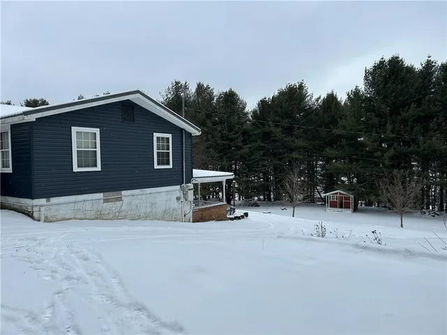 a view of house with outdoor space