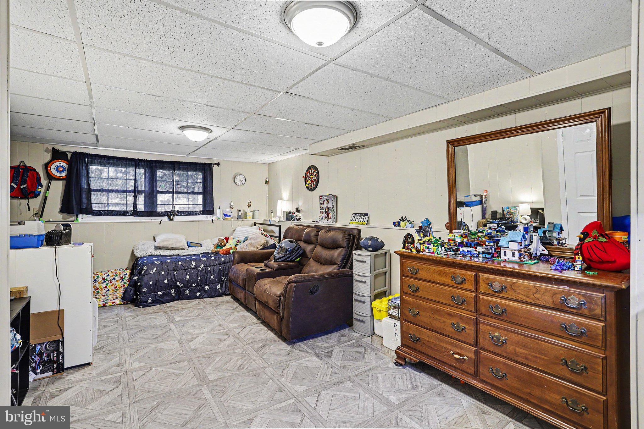 756 Fireside Road York, PA 17404 - Photo 21 of 29 Cozy basement retreat with charm.