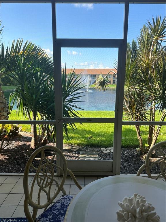 1950 West Crown Pointe Boulevard, Unit B106 Naples, FL 34112 - Photo 33 of 33 a view of swimming pool from a balcony