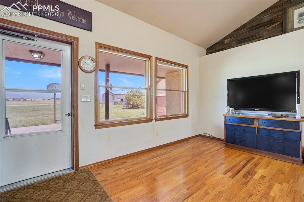 2550 Slocum Road Peyton, CO 80831 - Photo 16 of 50 a bedroom with window and flat screen tv